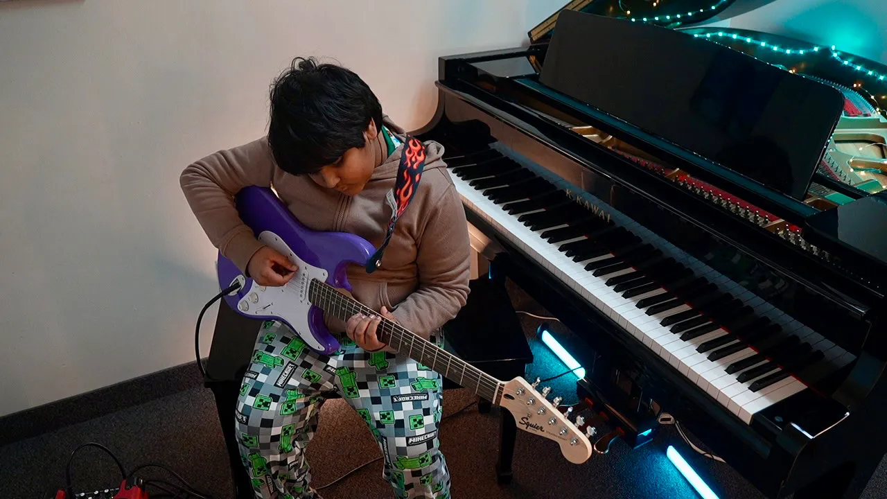 Kids guitar lessons at SYNERGY