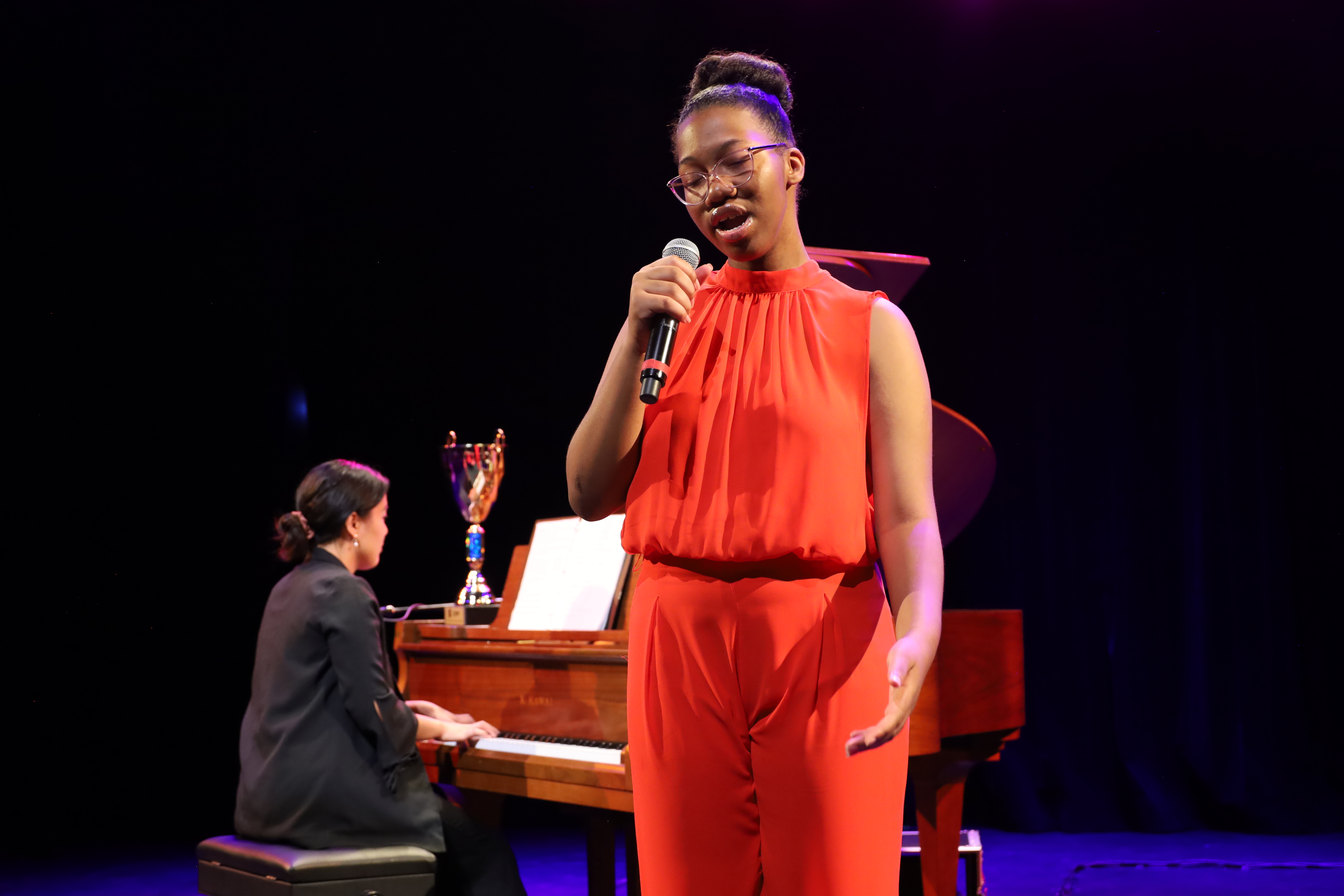 Singer performing at recital in Brampton for Synergy Performing Arts Academy