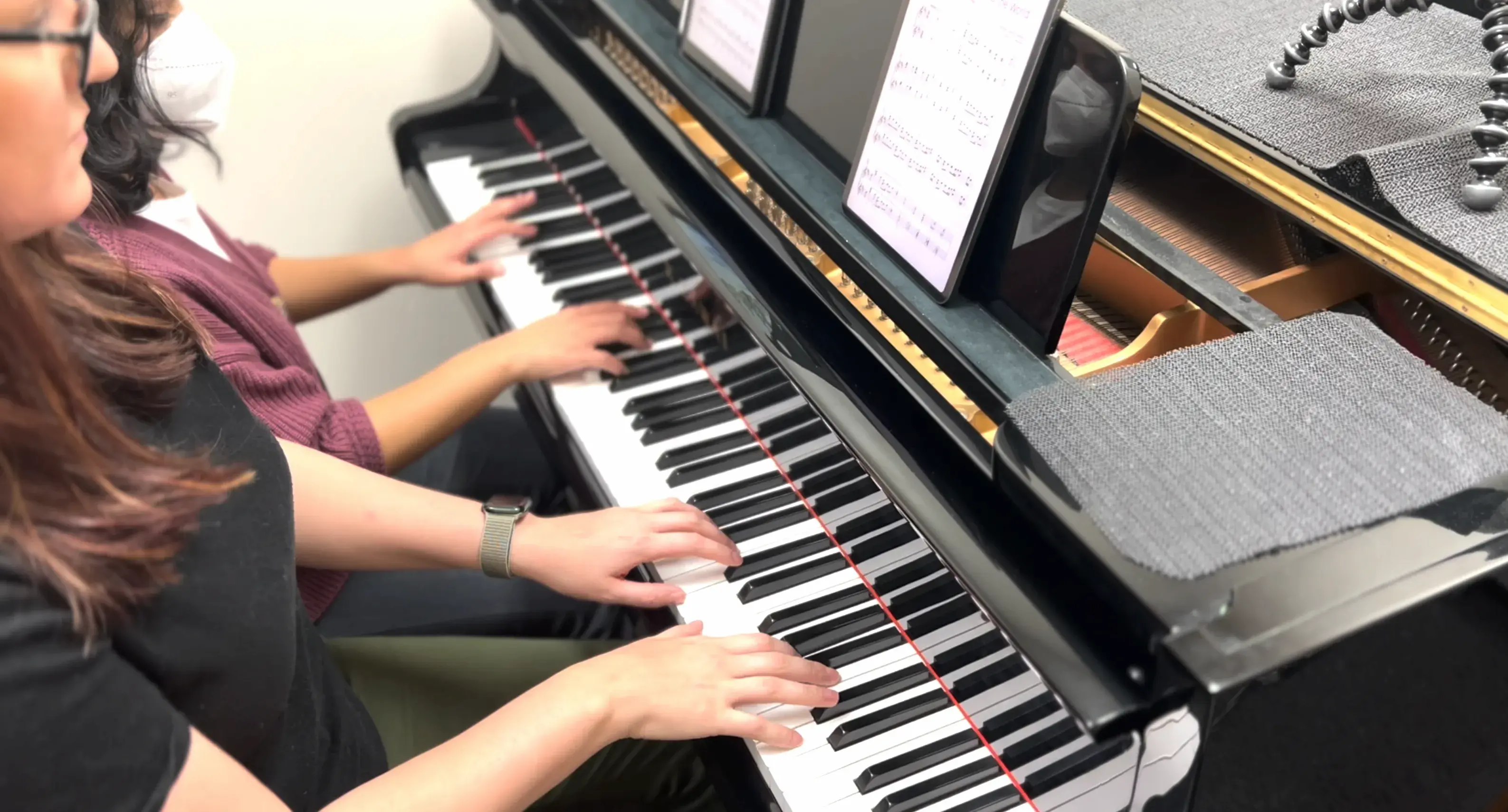 Teacher and student piano lesson at SYNERGY Performing Arts in Brampton