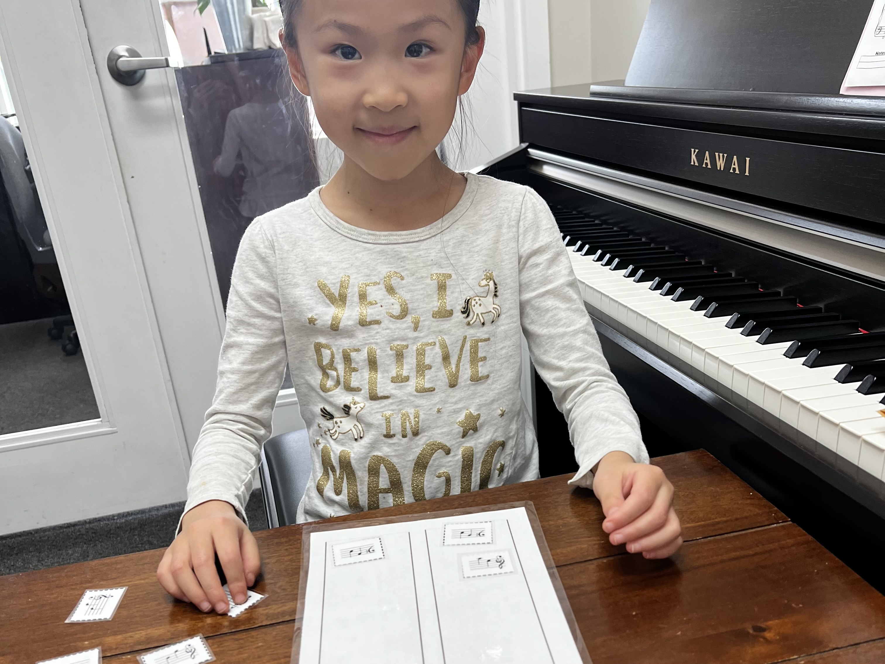 Child taking a music lesson at SYNERGY
